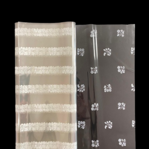 FOGLI CELLOPHANE TRASP. STAMPATO 30MY CM 100X130 50PZ fiorellini-bianchi (Cod. 106-10)